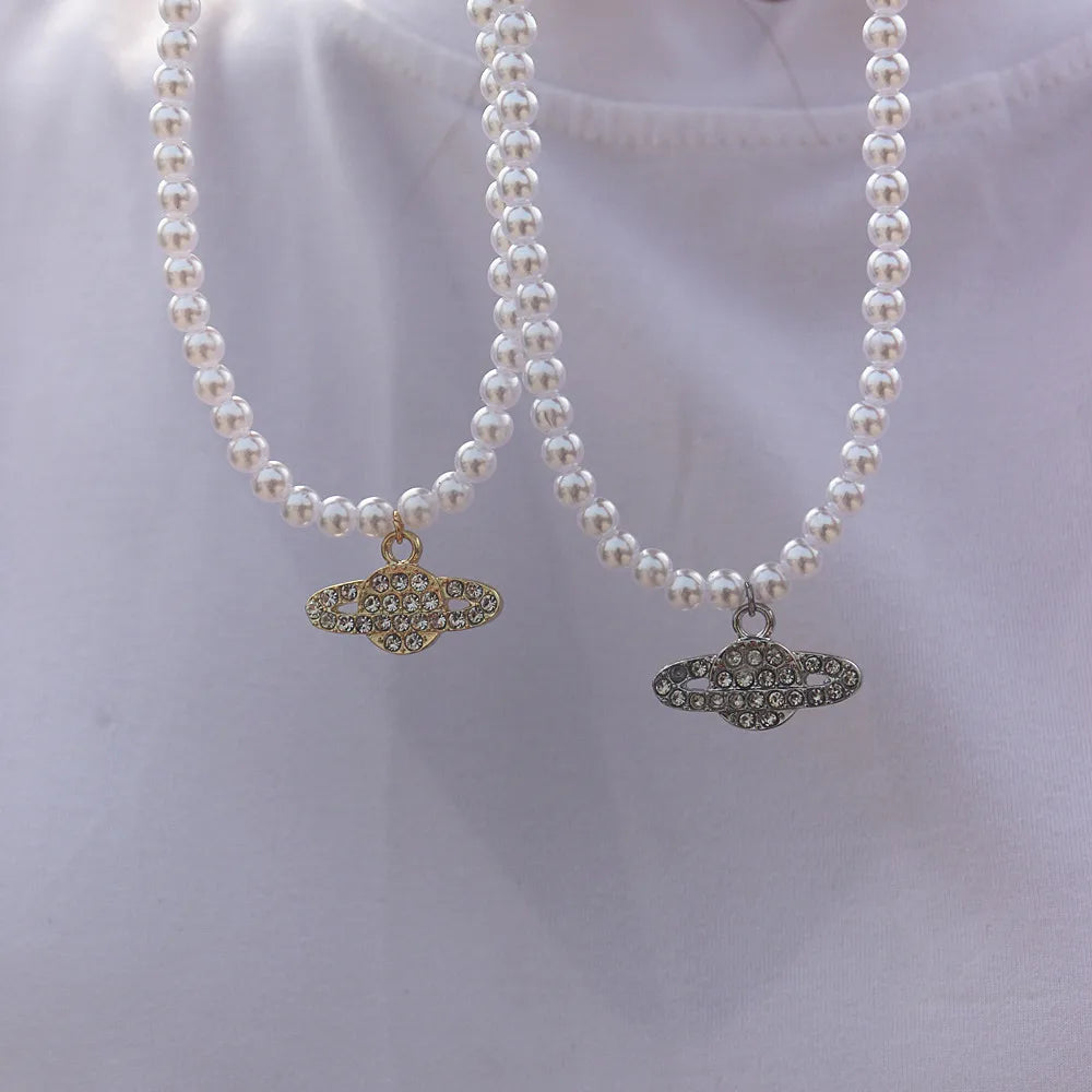 Vintage Saturn Pearl Necklace.