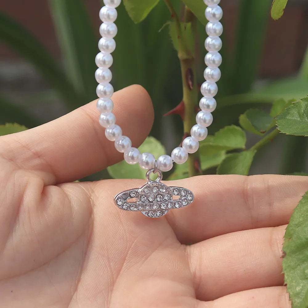 Vintage Saturn Pearl Necklace.