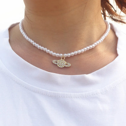 Vintage Saturn Pearl Necklace.