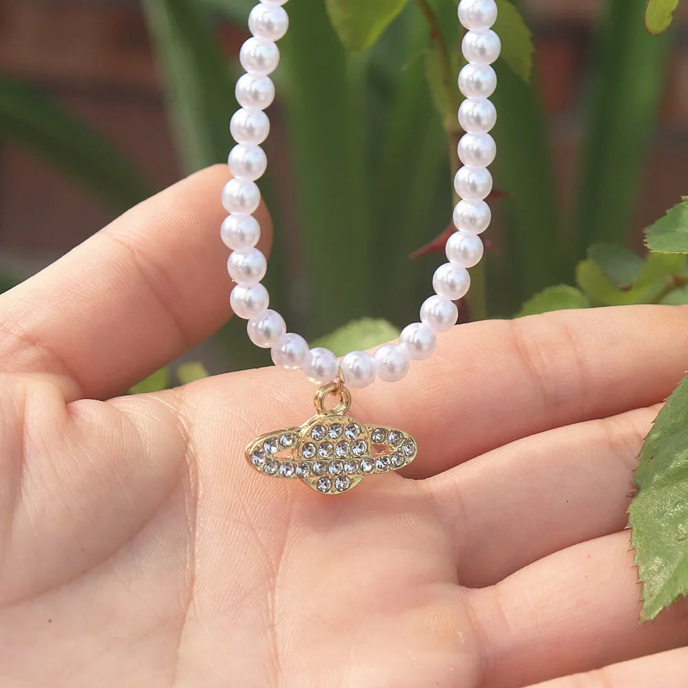 Vintage Saturn Pearl Necklace.