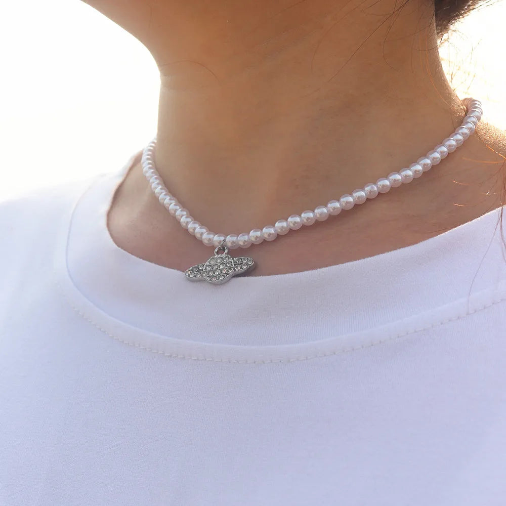 Vintage Saturn Pearl Necklace.