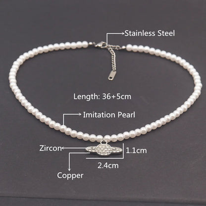 Vintage Saturn Pearl Necklace.